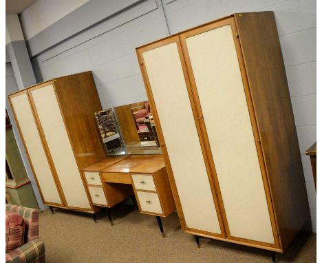 Wrighton: a mid-century bedroom suite, comprising: a pair of two-door wardrobes with caddy tops, two cupboard doors enclosing