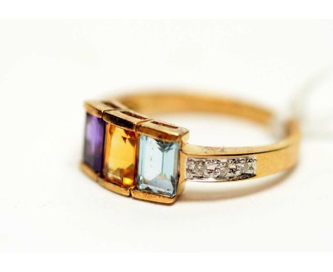 An amethyst, citrine, topaz and diamond ring, set with single rectangular step cut amethyst, citrine and topaz flanked by bri