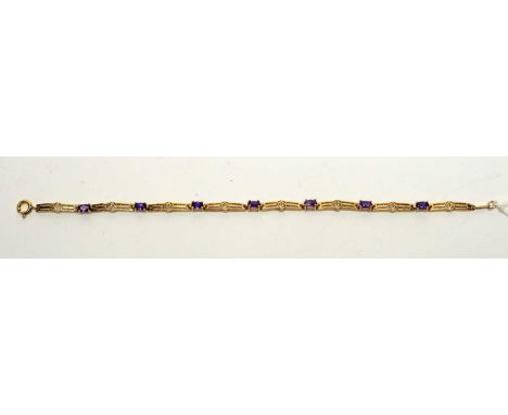An amethyst set 9ct yellow gold bracelet, with Mackintosh style rose decoration, 4.5g gross, 18cms long.