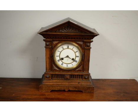 Early 20th century mahogany mantel clock, the white Roman dial signed Junghans, in architectural case. 