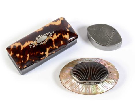 A Georgian carved mother-of-pearl and tortoiseshell oval snuff box, 7cms; a 19th Century horn and tortoiseshell snuff box, 8c