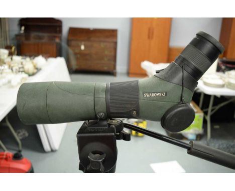 Swarovski spotting scope, on Swarovski tripod stand with Manfrotto tripod head and carry strap.
