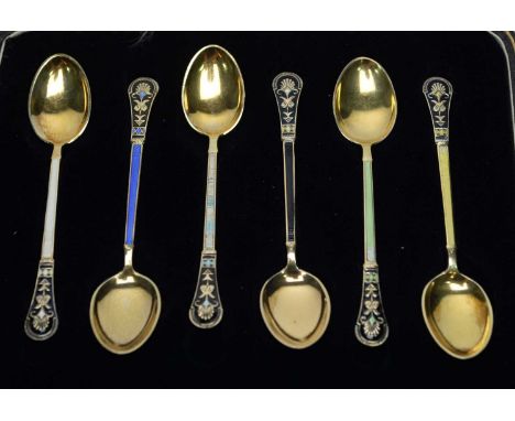 A set of six silver gilt and enamel coffee spoons, by Axel Holmsen, Norway, in fitted case.