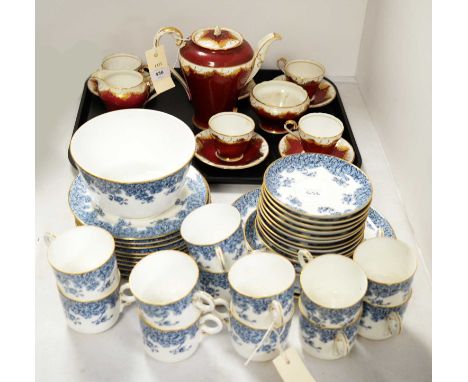 Royal Worcester part tea service, decorated with blue flowers and a gilt border on white ground, comprising over 35 pieces ov