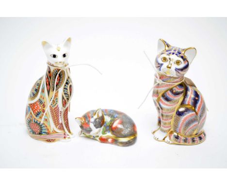 Royal Crown Derby 'Siamese Cat' paperweight, 13.5cms high; along with Royal Crown Derby Collectors Guild 'Catnip Kitten' pape