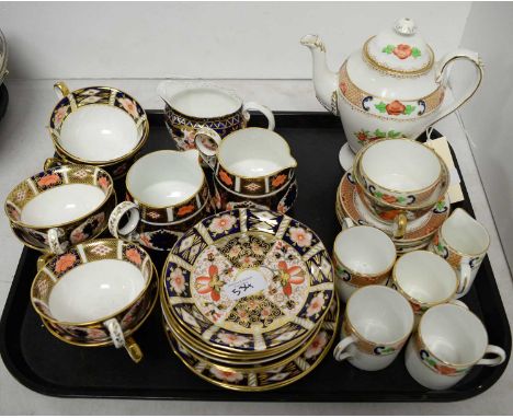 Royal Crown Derby Imari tea service, comprising six cups and saucers, three cream jugs and saucers; along with a New Chelsea 