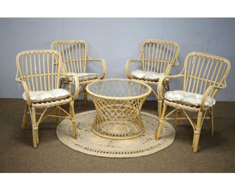 Vintage bamboo conservatory furniture, comprising: four chairs and a circular waisted coffee table with glass top; and a rush