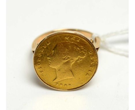 A Queen Victoria half sovereign, 1848, in yellow metal ring mount, stamped inverter '9ct', ring size X, 6.6g gross.