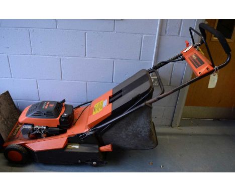 A Flymo Hi-Tec 4.0HP RRL 420 roller rotary petrol mower; and a McCulloch 'The Californian' chainsaw. (2)