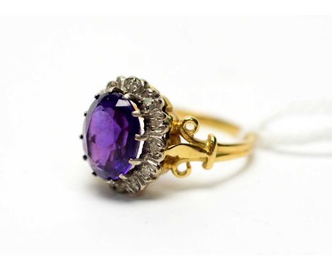 An amethyst and diamond cluster ring, in 18ct yellow gold shank, ring size M.