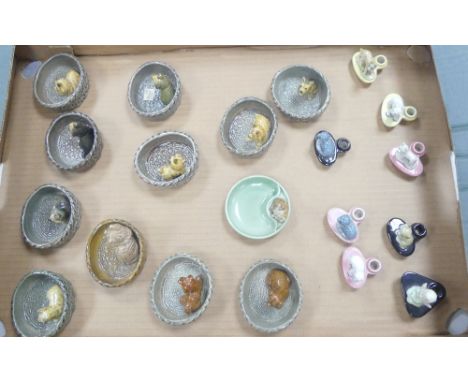 A collection of Wade candle stick holders and dogs in baskets to include terriers, polar bears, sea lions, etc (1 tray)