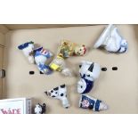 A collection of Wade figures to include Panda, Pantomime dame, Pantomime Horse, The Official