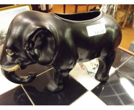 Ceramic plant stand in the form of an elephant 