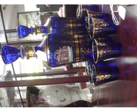 Decanter and 6 shot glasses 
