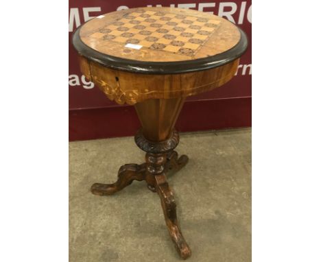 An early Victorian inlaid rosewood and mahogany trumpet shaped lady's sewing/games table 