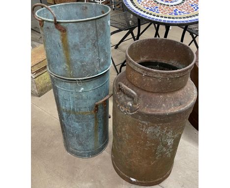 A galvanised butter churn and a milk churn 