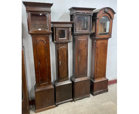 Four oak longcase clock cases, including George III