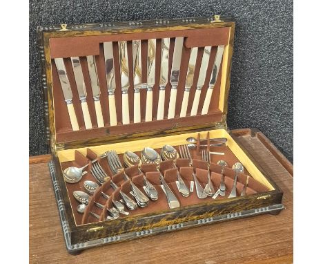 An oak cased canteen of plated cutlery, with faux ivory handles