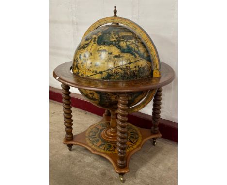 A large Italian terrestrial globe cocktail cabinet/trolley 