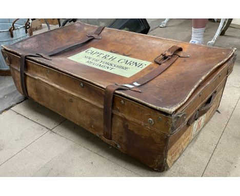 An early 20th Century leather travel trunk, formerly a prop in the TV show Sharpe's Justice, belonging to the character Capta