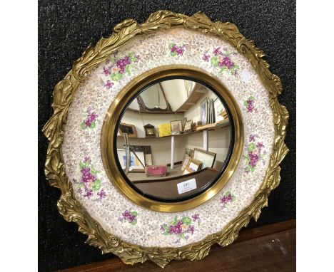 A Burleigh Ware porcelain and gilt metal convex mirror 