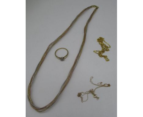 9ct yellow gold illusion set diamond solitaire ring, stamped 375, size Q, a 9ct gold multi tone necklace, clasp stamped 375, 