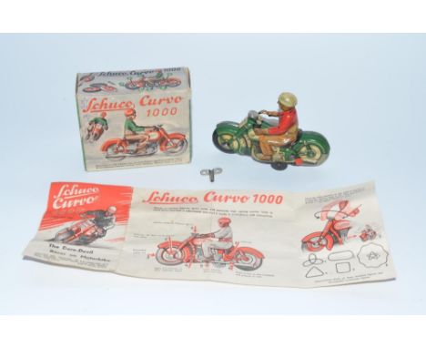Schuco Curvo 1000 early 1950s tinplate clockwork motorcycle with original box and instruction sheet, tested and runs well alt