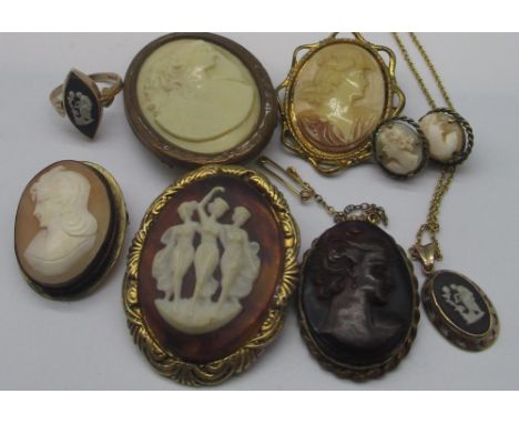 Four Victorian and later cameo brooches, all on yellow metal mounts, a similar clip with relief decoration of three Grecian w
