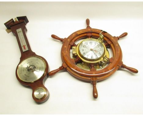 C20th quartz ships clock in the form of a ships wheel, Diameter 37cm  and a Comitti of London mahogany case Georgian style an