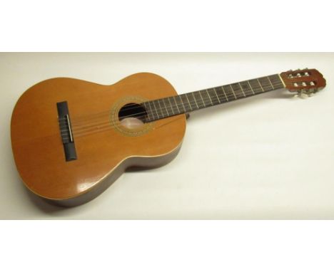Maya 6 string acoustic guitar, model no C136S in hard carry case, and a BM Sevilla Spanish 6 string acoustic guitar (2) 