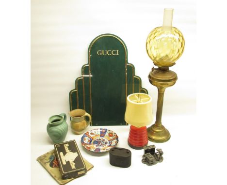 Green Gucci board, brass oil lamp with glass shade and flume, Birmingham Municipal Bank money box, pictures and miscellaneous