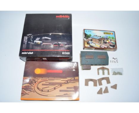 Boxed Marklin Z Gauge electric train set 81560 with transformer, track, instructions and layout guides, a 2-6-0 loco with ten