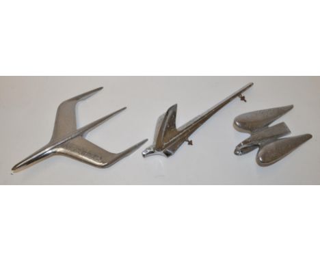 Three vintage American hood ornaments, including 1950 Chevrolet, 1954 Eagle Chrysler, mid 1950's era Mercury Monterey Mont Cl