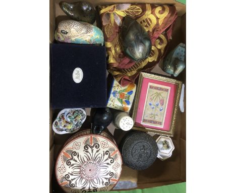 Three Isle of Wight studio glass paperweights, late c20th Egyptian and Asian style soapstone figures, cast metal model of Shi
