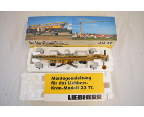 Boxed 1/50 scale diecast Liebherr 32 TT fast erecting crane model by NZG (model no 521). Good previously displayed condition,