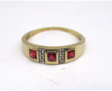 9ct yellow gold ring set with three square cut rubies and milgrain set diamonds, stamped 9k, size W, 2.3g 
