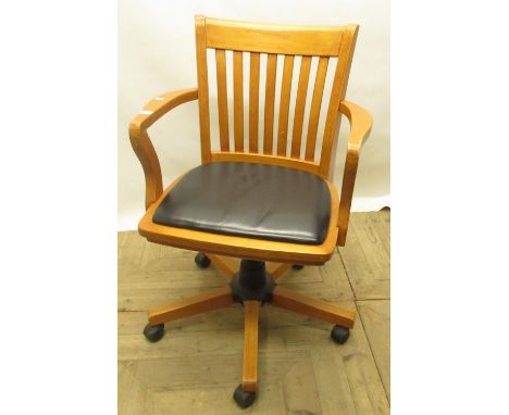 Light wood office swivel chair 