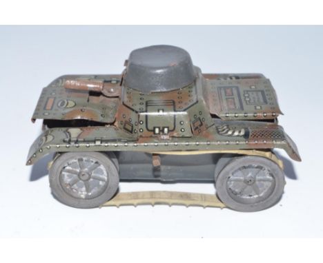 Vintage English tinplate clockwork model tank, with intact rubber tracks in full and fair working order, external condition e