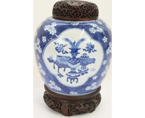 Chinese Kangxi period porcelain jar decorated in underglaze blue with a prunus and cracked ice background with panels of prec
