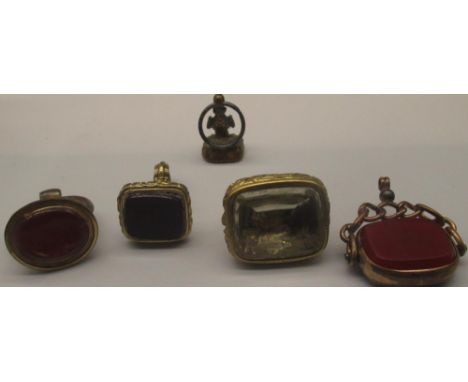 Four Victorian and later seal fobs, two set with coloured stones, one set with intaglio portrait, the other with lettering, a