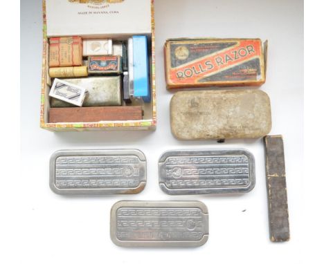 Collection of vintage razors including 5 Rolls Razors, a cut throat and 2 others, blade packs, sharpening stone and a packet 