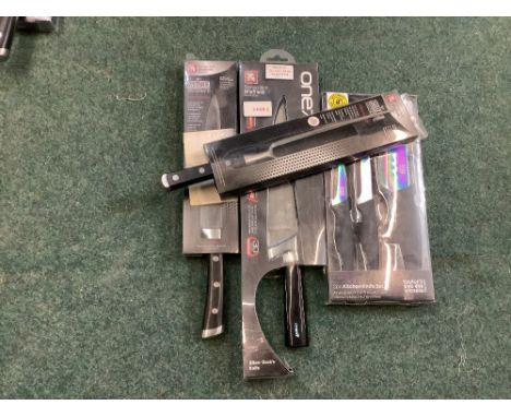 Sabatier professional carving knife and carving fork, Richardson’s of Sheffield cooks knife and a Taylor’s eye witness 3pc ki