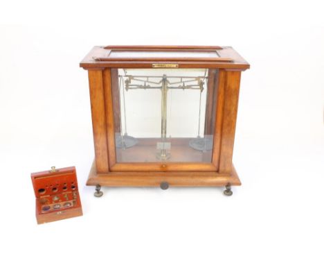 F. E. Becker chemist balance scales with sliding glazed panels and weights 