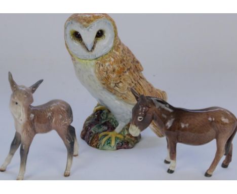 Beswick standing Donkey model 950, another Beswick Donkey and a Beswick Barn owl model 1046 (3) 