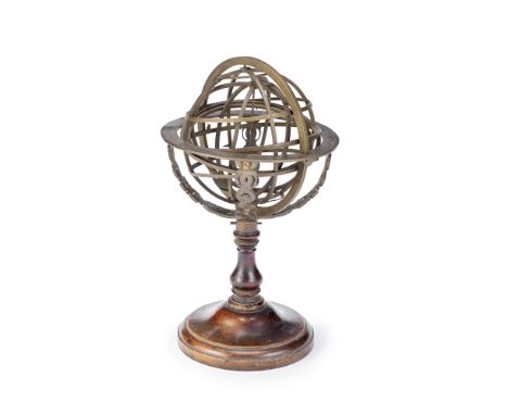 A BRASS ARMILLARY SPHERE, ITALIAN, PROBABLY 17TH CENTURY,the inner ring mounted with two pinhole sights, the equatorial ring 