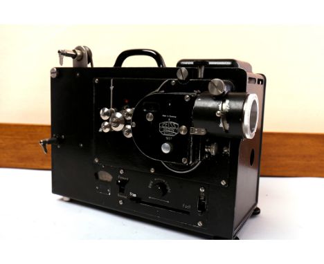 ZEISS IKON PROJECTORserial number W.73586, ebonised finish, in fitted hard case; together with a mid-twentieth century projec