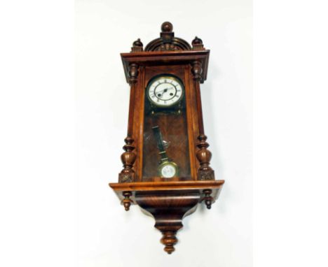 LATE NINETEENTH CENTURY MAHOGANY VIENNA STYLE WALL CLOCKunsigned two train movement, the 5.5 inch gilt enamel dial with Roman