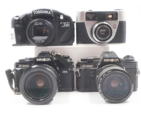 Case containing four 35mm cameras including Minolta. UK P&amp;P Group 2 (£20+VAT for the first lot and £4+VAT for subsequent 