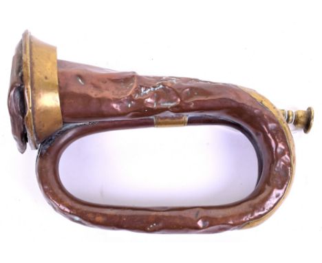 WW1 1917 Dated Bugle, in copper with brass fittings. Maker marked ‘Boosey & Co’ and clear 1917 date,heavily dented and worn 