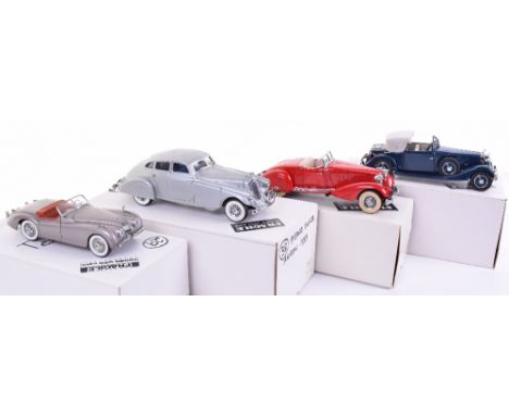 Four Danbury Mint 1:25 scale models,1949 Jaguar XK120, 1934 Packard V-12 Lebaron Speedster, 1933 Pierce Silver Arrow and 1934